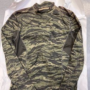 Men’s compression shirt. Nice, thick and warm. Medium